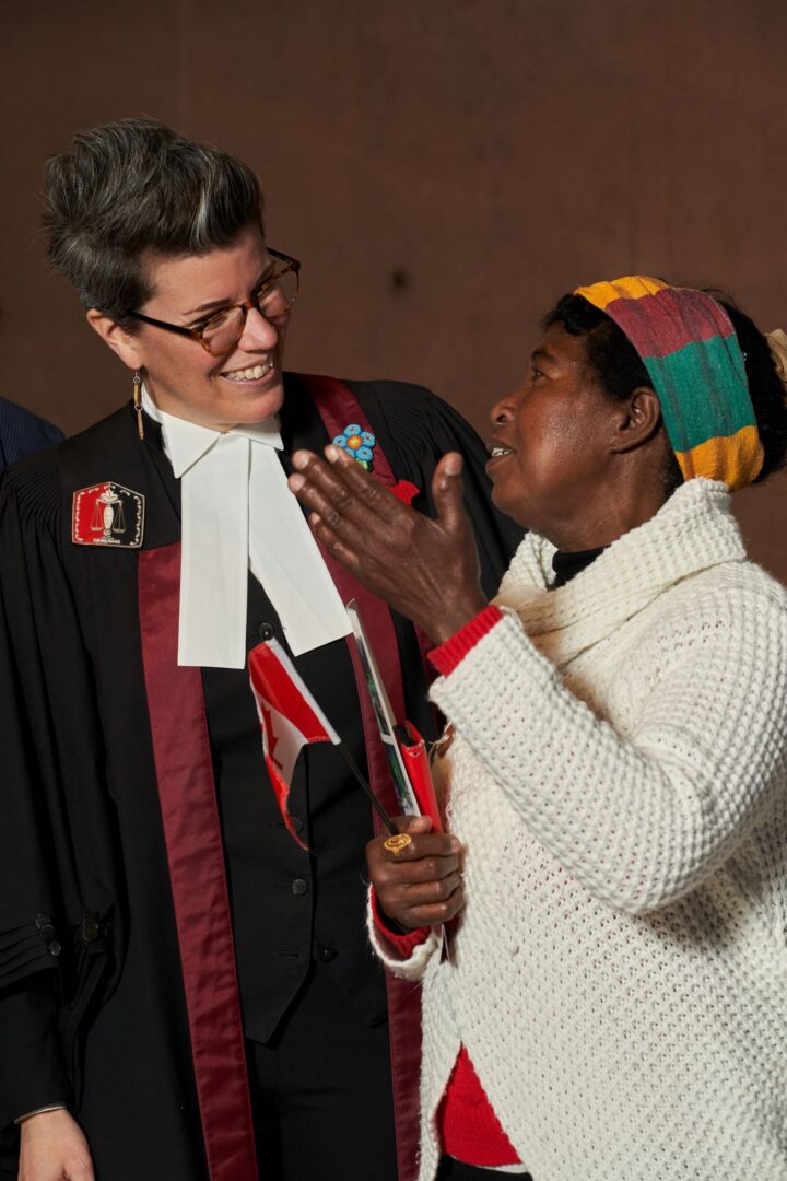Two adults in conversation.