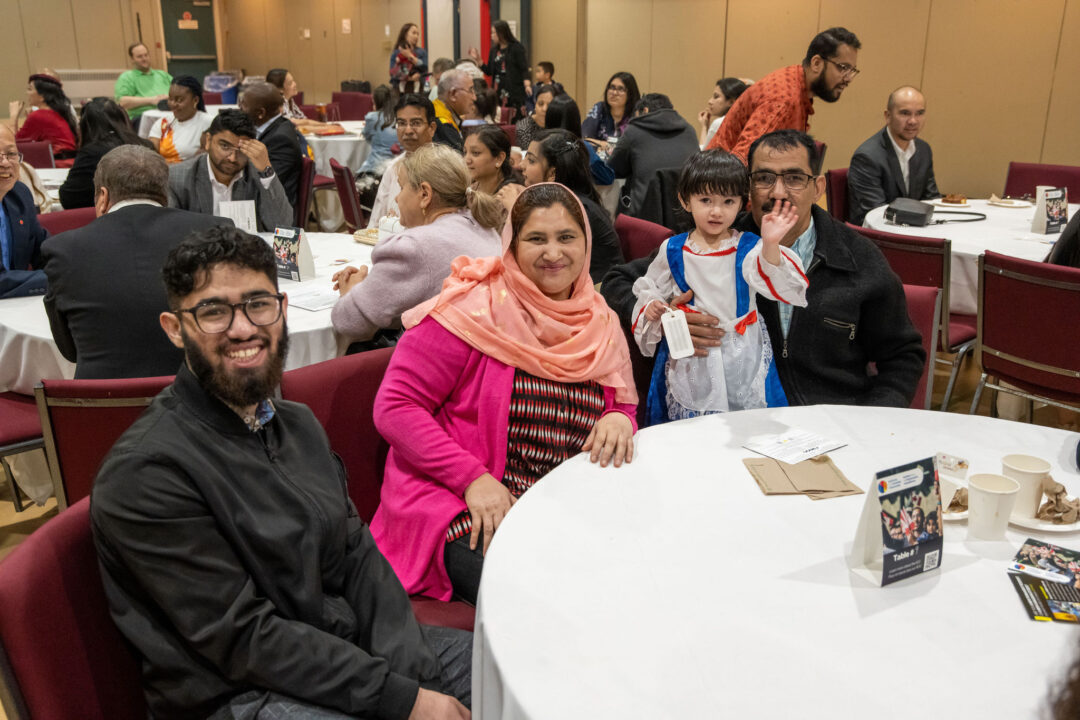 Group of people at a citizenship ceremony.