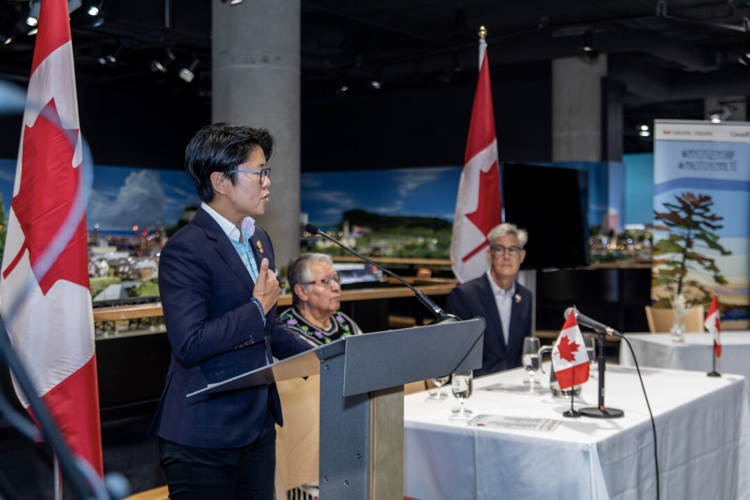 MPP Kristyn Wong-Tam speaking at citizenship ceremony in Little Canada.