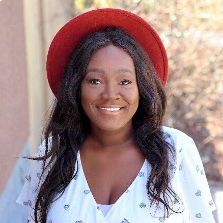 Headshot of Carine Bado